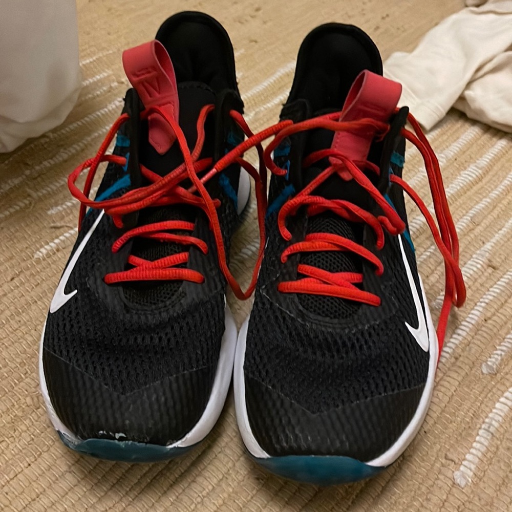 Nike boys basketball shoes or woman's volleyball shoes